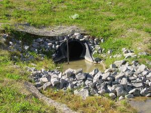 stormwater flowing through a storm drain